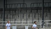 18 October 2020; Kildare players Tommy Moolick, left, and Kevin Flynn make their way past an empty section of the stand after the Allianz Football League Division 2 Round 6 match between Kildare and Cavan at St Conleth's Park in Newbridge, Kildare. Photo by Piaras Ó Mídheach/Sportsfile