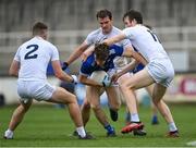 18 October 2020; Oisín Kiernan of Cavan is tackled by Kildare players, from left, Shea Ryan, Con Kavanagh, and Paddy Brophy during the Allianz Football League Division 2 Round 6 match between Kildare and Cavan at St Conleth's Park in Newbridge, Kildare. Photo by Piaras Ó Mídheach/Sportsfile