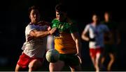 18 October 2020; Jamie Brennan of Donegal in action against Kieran McGeary of Tyrone during the Allianz Football League Division 1 Round 6 match between Donegal and Tyrone at MacCumhail Park in Ballybofey, Donegal. Photo by David Fitzgerald/Sportsfile