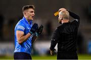 17 October 2020; John Small of Dublin is shown a yellow card by Referee Brendan Cawley during the Allianz Football League Division 1 Round 6 match between Dublin and Meath at Parnell Park in Dublin. Photo by Ramsey Cardy/Sportsfile