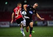 19 October 2020; Greg Sloggett of Dundalk in action against Ciaron Harkin of Derry City during the SSE Airtricity League Premier Division match between Derry City and Dundalk at Ryan McBride Brandywell Stadium in Derry. Photo by Harry Murphy/Sportsfile