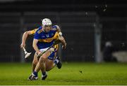 19 October 2020; Devon Ryan of Tipperary gets past Dylan McMahon of Clare during the Bord Gáis Energy Munster Hurling Under 20 Championship Quarter-Final match between Tipperary and Clare at Semple Stadium in Thurles, Tipperary. Photo by Piaras Ó Mídheach/Sportsfile