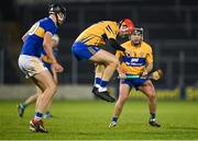 19 October 2020; Darragh Lohan of Clare gathers the ball with his feet after losing his hurl during the Bord Gáis Energy Munster Hurling Under 20 Championship Quarter-Final match between Tipperary and Clare at Semple Stadium in Thurles, Tipperary. Photo by Piaras Ó Mídheach/Sportsfile
