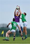 18 October 2020; Nick Doyle of Wexford in action against Cillian Fahy of Limerick during the Allianz Football League Division 4 Round 6 match between Limerick and Wexford at Mick Neville Park in Rathkeale, Limerick. Photo by Eóin Noonan/Sportsfile