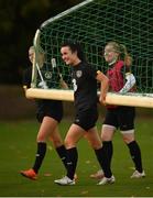 21 October 2020; Niamh Farrelly and team-mates move a goalpost into position during a Republic of Ireland Women training session at Sportschule Wedau in Duisburg, Germany. Photo by Stephen McCarthy/Sportsfile