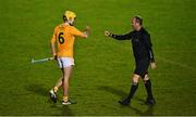 21 October 2020; Daire Murphy of Antrim with referee Kevin Brady following the Bord Gáis Energy Leinster GAA Hurling U20 Championship Round 1 match between Antrim and Dublin at Louth Centre of Excellence, Darver in Louth. Photo by Eóin Noonan/Sportsfile