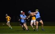 21 October 2020; Tom Scally of Antrim is tackled by Liam Murphy, left, and Kevin Burke of Dublin during the Bord Gáis Energy Leinster GAA Hurling U20 Championship Round 1 match between Antrim and Dublin at Louth Centre of Excellence, Darver in Louth. Photo by Eóin Noonan/Sportsfile