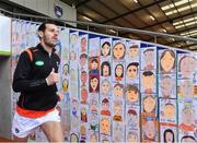 17 October 2020; Jamie Clarke of Armagh makes his way past self portraits from over 3,000 primary school children across Armagh in the stands as Referee David Gough throws the ball in during the Allianz Football League Division 2 Round 6 match between Armagh and Roscommon at the Athletic Grounds in Armagh. Photo by Piaras Ó Mídheach/Sportsfile