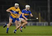 19 October 2020; Devon Ryan of Tipperary in action against Aidan Moriarty of Clare during the Bord Gáis Energy Munster Hurling Under 20 Championship Quarter-Final match between Tipperary and Clare at Semple Stadium in Thurles, Tipperary. Photo by Piaras Ó Mídheach/Sportsfile