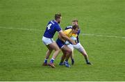24 October 2020; Enda Smith of Roscommon in action against Killian Clarke, left, and Christopher McGuinness of Cavan during the Allianz Football League Division 2 Round 7 match between Cavan and Roscommon at Kingspan Breffni Park in Cavan. Photo by Daire Brennan/Sportsfile