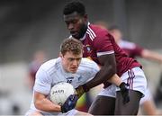 24 October 2020; Jimmy Hyland of Kildare is tackled by Boidu Sayeh of Westmeath during the Allianz Football League Division 2 Round 7 match between Kildare and Westmeath at St Conleth's Park in Newbridge, Kildare. Photo by Piaras Ó Mídheach/Sportsfile