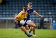 24 October 2020; Seán Mullooly of Roscommon in action against Conor Madden of Cavan during the Allianz Football League Division 2 Round 7 match between Cavan and Roscommon at Kingspan Breffni Park in Cavan. Photo by Daire Brennan/Sportsfile