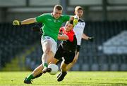 24 October 2020; Hugh Bourke of Limerick shoots to score his side's first goal despite the tackle of Eamonn Kilgannon of Sligo during the Allianz Football League Division 4 Round 7 match between Sligo and Limerick at Markievicz Park in Sligo. Photo by Harry Murphy/Sportsfile