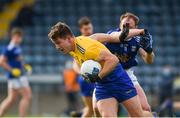 24 October 2020; Seán Mullooly of Roscommon in action against Martin Reilly of Cavan during the Allianz Football League Division 2 Round 7 match between Cavan and Roscommon at Kingspan Breffni Park in Cavan. Photo by Daire Brennan/Sportsfile