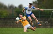 24 October 2020; Niall Delargy of Antrim in action against Tony Grey of Waterford during the Allianz Football League Division 4 Round 7 match between Antrim and Waterford at McGeough Park in Haggardstown, Louth. Photo by David Fitzgerald/Sportsfile
