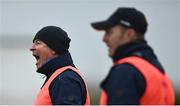 24 October 2020; Antrim manager Lenny Harbinson, left, and selector Fintan Devlin during the Allianz Football League Division 4 Round 7 match between Antrim and Waterford at McGeough Park in Haggardstown, Louth. Photo by David Fitzgerald/Sportsfile