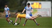 24 October 2020; James McAuley of Antrim in action against Jack Mullaney of Waterford during the Allianz Football League Division 4 Round 7 match between Antrim and Waterford at McGeough Park in Haggardstown, Louth. Photo by David Fitzgerald/Sportsfile