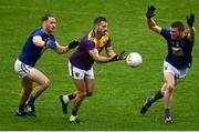24 October 2020; Brian Malone of Wexford in action against Dean Healy, left, and Rory Finn of Wicklow during the Allianz Football League Division 4 Round 7 match between Wexford and Wicklow at Chadwicks Wexford Park in Wexford. Photo by Sam Barnes/Sportsfile
