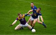 24 October 2020; Nick Doyle of Wexford in action against Dean Healy, right, and Niall Donnelly of Wicklow during the Allianz Football League Division 4 Round 7 match between Wexford and Wicklow at Chadwicks Wexford Park in Wexford. Photo by Sam Barnes/Sportsfile