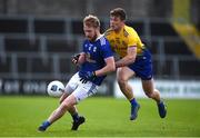 24 October 2020; Christopher McGuinness of Cavan in action against Finbarr Cregg of Roscommon during the Allianz Football League Division 2 Round 7 match between Cavan and Roscommon at Kingspan Breffni Park in Cavan. Photo by Daire Brennan/Sportsfile