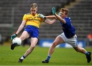 24 October 2020; Henry Walsh of Roscommon in action against Jason McLoughlin of Cavan during the Allianz Football League Division 2 Round 7 match between Cavan and Roscommon at Kingspan Breffni Park in Cavan. Photo by Daire Brennan/Sportsfile