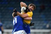 24 October 2020; Ultan Harney of Roscommon in action against Martin Reilly of Cavan during the Allianz Football League Division 2 Round 7 match between Cavan and Roscommon at Kingspan Breffni Park in Cavan. Photo by Daire Brennan/Sportsfile