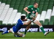 24 October 2020; Jacob Stockdale of Ireland is tackled by Abraham Steyn of Italy during the Guinness Six Nations Rugby Championship match between Ireland and Italy at the Aviva Stadium in Dublin. Photo by Ramsey Cardy/Sportsfile