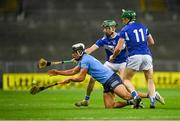 24 October 2020; Cian Boland of Dublin in action against Aaron Dunphy, centre, and Willie Dunphy of Laois during the Leinster GAA Hurling Senior Championship Quarter-Final match between Laois and Dublin at Croke Park in Dublin. Photo by Piaras Ó Mídheach/Sportsfile