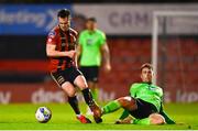 24 October 2020; Michael Barker of Bohemians in action against Mark Russell of Finn Harps during the SSE Airtricity League Premier Division match between Bohemians and Finn Harps at Dalymount Park in Dublin. Photo by Eóin Noonan/Sportsfile