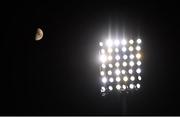 24 October 2020; A First Quarter moon above the floodlights during the Women's Six Nations Rugby Championship match between Ireland and Italy at Energia Park in Dublin. Due to current restrictions laid down by the Irish government to prevent the spread of coronavirus and to adhere to social distancing regulations, all sports events in Ireland are currently held behind closed doors. Photo by Ramsey Cardy/Sportsfile
