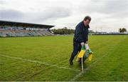 25 October 2020; Groundsman Micheál Doherty puts out side-line flags prior to the Allianz Football League Division 3 Round 7 match between Leitrim and Tipperary at Avantcard Páirc Sean Mac Diarmada in Carrick-on-Shannon, Leitrim. Photo by Seb Daly/Sportsfile