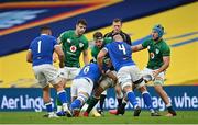 24 October 2020; Caelan Doris of Ireland is tackled by Sebastian Negri, left, and Marco Lazzaroni of Italy  during the Guinness Six Nations Rugby Championship match between Ireland and Italy at the Aviva Stadium in Dublin. Due to current restrictions laid down by the Irish government to prevent the spread of coronavirus and to adhere to social distancing regulations, all sports events in Ireland are currently held behind closed doors. Photo by Seb Daly/Sportsfile