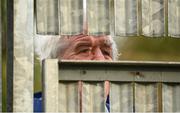 25 October 2020; A supporter watches through a fence during the Allianz Football League Division 1 Round 7 match between Monaghan and Meath at St Tiernach's Park in Clones, Monaghan. Photo by Harry Murphy/Sportsfile