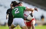 25 October 2020; Darragh Canavan of Tyrone is tackled by Oisín Mullin of Mayo during the Allianz Football League Division 1 Round 7 match between Mayo and Tyrone at Elverys MacHale Park in Castlebar, Mayo. Photo by Piaras Ó Mídheach/Sportsfile