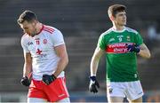 25 October 2020; Conor McKenna of Tyrone celebrates scoring his side's first goal as Conor Loftus of Mayo looks on during the Allianz Football League Division 1 Round 7 match between Mayo and Tyrone at Elverys MacHale Park in Castlebar, Mayo. Photo by Piaras Ó Mídheach/Sportsfile