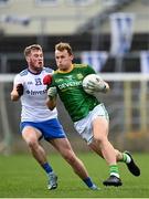 25 October 2020; Ronan Jones of Meath in action against Andrew Woods of Monaghan during the Allianz Football League Division 1 Round 7 match between Monaghan and Meath at St Tiernach's Park in Clones, Monaghan. Photo by Harry Murphy/Sportsfile