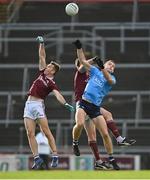 25 October 2020; Brian Fenton of Dublin in action against Jason Leonard, left, and Cein D'Arcy of Galway during the Allianz Football League Division 1 Round 7 match between Galway and Dublin at Pearse Stadium in Galway. Photo by Ramsey Cardy/Sportsfile