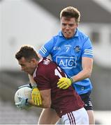 25 October 2020; Jason Leonard of Galway is tackled by Robert McDaid of Dublin during the Allianz Football League Division 1 Round 7 match between Galway and Dublin at Pearse Stadium in Galway. Photo by Ramsey Cardy/Sportsfile