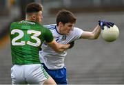 25 October 2020; Stephen O'Hanlon of Monaghan in action against Jordan Morris of Meath during the Allianz Football League Division 1 Round 7 match between Monaghan and Meath at St Tiernach's Park in Clones, Monaghan. Photo by Harry Murphy/Sportsfile