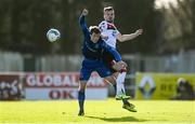 25 October 2020; Cameron Dummigan of Dundalk contests a high ball with Will Fitzgerald of Waterford during the SSE Airtricity League Premier Division match between Waterford and Dundalk at RSC in Waterford. Photo by Sam Barnes/Sportsfile
