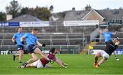 25 October 2020; Con O'Callaghan of Dublin shoots to score his side's second goal past Galway goalkeeper Bernard Power and Sean Mulkerrin during the Allianz Football League Division 1 Round 7 match between Galway and Dublin at Pearse Stadium in Galway. Photo by Ramsey Cardy/Sportsfile