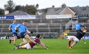 25 October 2020; Con O'Callaghan of Dublin shoots to score his side's second goal past Galway goalkeeper Bernard Power and Sean Mulkerrin during the Allianz Football League Division 1 Round 7 match between Galway and Dublin at Pearse Stadium in Galway. Photo by Ramsey Cardy/Sportsfile