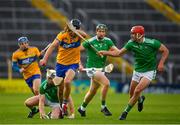 25 October 2020; Cathal Malone of Clare in action against Barry Nash of Limerick during the Munster GAA Hurling Senior Championship Quarter-Final match between Limerick and Clare at Semple Stadium in Thurles, Tipperary. This game also doubles up as the Allianz Hurling League Division 1 Final as the GAA season was shortened due to the coronavirus pandemic and both teams had qualified for the final. Photo by Ray McManus/Sportsfile