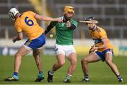 25 October 2020; Tom Morrissey of Limerick in action against Patrick O'Connor, left, and Stephen O'Halloran of Clare during the Munster GAA Hurling Senior Championship Quarter-Final match between Limerick and Clare at Semple Stadium in Thurles, Tipperary. This game also doubles up as the Allianz Hurling League Division 1 Final as the GAA season was shortened due to the coronavirus pandemic and both teams had qualified for the final. Photo by Daire Brennan/Sportsfile