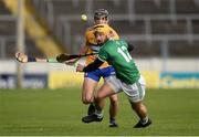 25 October 2020; Tom Morrissey of Limerick in action against Stephen O'Halloran of Clare during the Munster GAA Hurling Senior Championship Quarter-Final match between Limerick and Clare at Semple Stadium in Thurles, Tipperary. This game also doubles up as the Allianz Hurling League Division 1 Final as the GAA season was shortened due to the coronavirus pandemic and both teams had qualified for the final. Photo by Daire Brennan/Sportsfile
