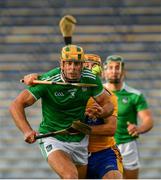 25 October 2020; David Reidy of Clare taps the sliotar away from Dan Morrissey of Limerick during the Munster GAA Hurling Senior Championship Quarter-Final match between Limerick and Clare at Semple Stadium in Thurles, Tipperary. This game also doubles up as the Allianz Hurling League Division 1 Final as the GAA season was shortened due to the coronavirus pandemic and both teams had qualified for the final. Photo by Ray McManus/Sportsfile