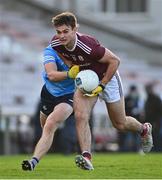 25 October 2020; Cillian McDaid of Galway and Robert McDaid of Dublin during the Allianz Football League Division 1 Round 7 match between Galway and Dublin at Pearse Stadium in Galway. Photo by Ramsey Cardy/Sportsfile