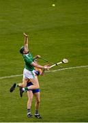 25 October 2020; William O’Donoghue of Limerick in action against David McInerney of Clare during the Munster GAA Hurling Senior Championship Quarter-Final match between Limerick and Clare at Semple Stadium in Thurles, Tipperary. This game also doubles up as the Allianz Hurling League Division 1 Final as the GAA season was shortened due to the coronavirus pandemic and both teams had qualified for the final. Photo by Eóin Noonan/Sportsfile