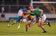 25 October 2020; Shane O'Donnell of Clare in action against Barry Nash of Limerick during the Munster GAA Hurling Senior Championship Quarter-Final match between Limerick and Clare at Semple Stadium in Thurles, Tipperary. This game also doubles up as the Allianz Hurling League Division 1 Final as the GAA season was shortened due to the coronavirus pandemic and both teams had qualified for the final. Photo by Daire Brennan/Sportsfile