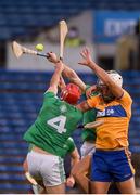 25 October 2020; Aron Shanagher of Clare in action against Barry Nash of Limerick during the Munster GAA Hurling Senior Championship Quarter-Final match between Limerick and Clare at Semple Stadium in Thurles, Tipperary. This game also doubles up as the Allianz Hurling League Division 1 Final as the GAA season was shortened due to the coronavirus pandemic and both teams had qualified for the final. Photo by Daire Brennan/Sportsfile